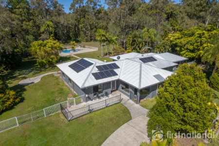 MASSIVE FAMILY HOME ON 5 ACRES WITH SHEDS & POOL IN A PRIME LOCATION