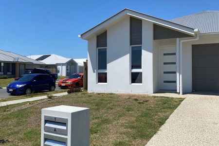 Near new three bedroom duplex in a convenient location close to all amenities