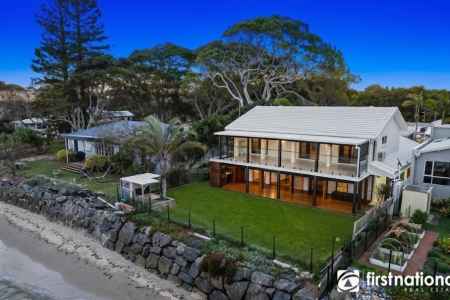 Stunning Family-Sized Waterfront Home with Exceptional Features