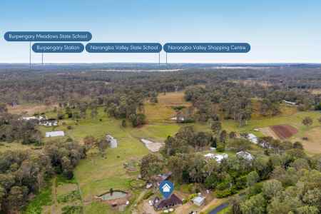 Peaceful Acreage Living with Exceptional Horse Facilities & Endless Lifestyle Appeal!