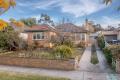 Original cream brick home in a prime location - an original masterpiece!