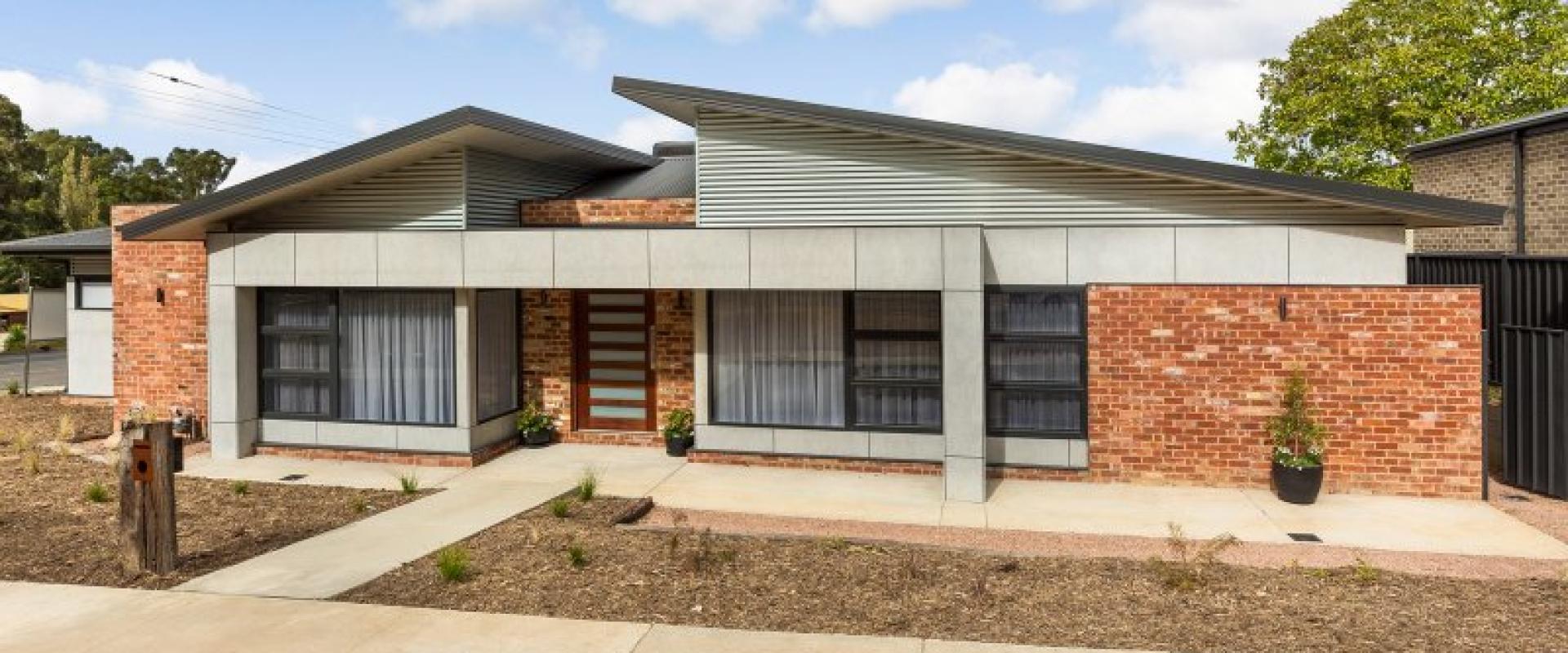 Gavin Butler Real Estate Arcjitecturally designed and extremely high end Townhouse