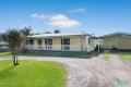 Family home on an 1,107m2 block ideal for the tradie