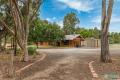 Outstanding mud brick home on 23 acres of cleared land with town water