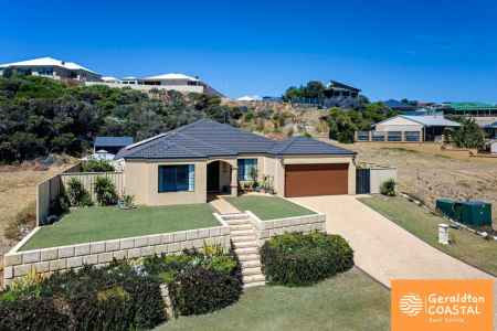High on the Hill – Ocean Views & Family Living at Its Finest