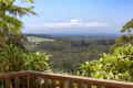 Charming Coastal Acreage with Ocean Views and a Blooming Legacy