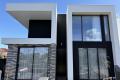 Bentleigh East's high-end modern townhouses are located at the corner of a quiet street