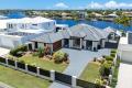 Stunning fully renovated single level home in prime deep water position.