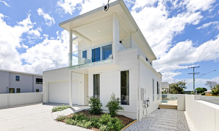 Modern Coastal Masterpiece with Exceptional Lifestyle Appeal.