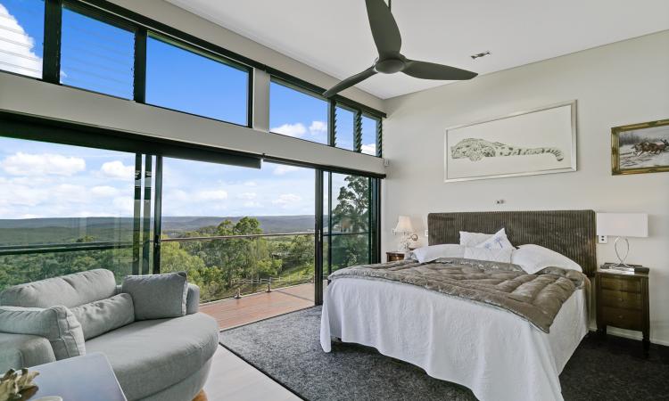 AWARD-WINNING ARCHITECTURE WITH ELEVATED COASTAL & HINTERLAND VIEWS