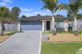 Tidy 4 Bedroom Home In Bellmere!