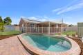 Perfect Family Home! 4-Bedrooms, Several Living Areas, Pool, Stylish Upgrades! Plus 10kw Solar!
