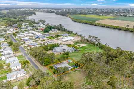 Low-Set Queenslander with Country Charm, and Riverfront Lifestyle