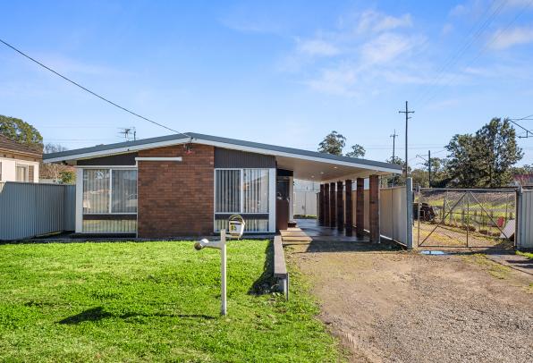 Spacious Block, Dual Income Potential with Large Shed