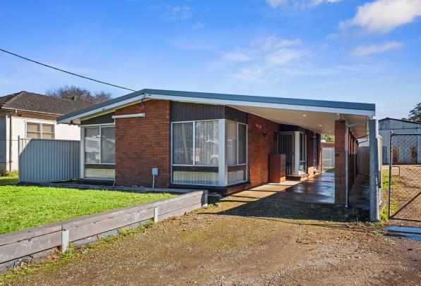 Spacious Block, Dual Income Potential with Large Shed