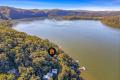 Stylish Riverfront Escape – North-East Facing Beauty with Shared Jetty Access