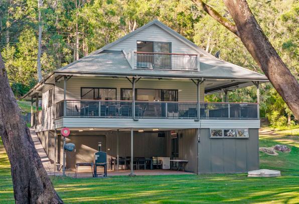 A Private Riverside Retreat Designed for Living, Entertaining & Escape