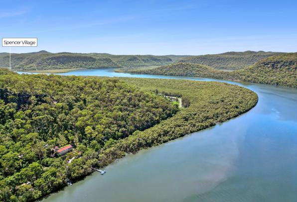 FLOOD-FREE LIVING, DEEP-WATER ACCESS & ONE OF SPENCER'S MOST COMPLETE LIFESTYLE PACKAGES