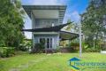 Two-storey residence epitomises breezy tropical living
