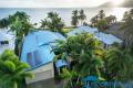 Waterfront Masterpiece of Tropical Grandeur