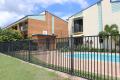 Party Furnished Townhouse - Two bedroom, air conditioning, balcony & carport!