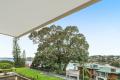 North Facing Sun Filled Apartment with Tranquil Harbour Views