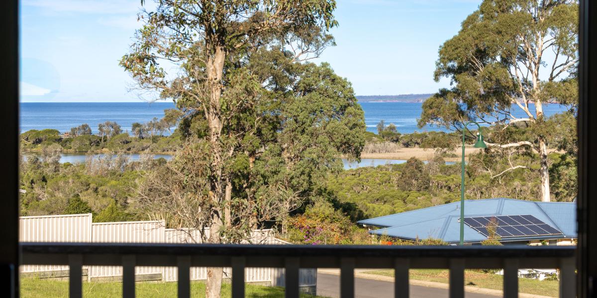 Rare Half Acre Coastal Holding with Water Views & Development Potential