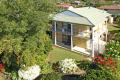 Huge family home with attic and views in Jindalee