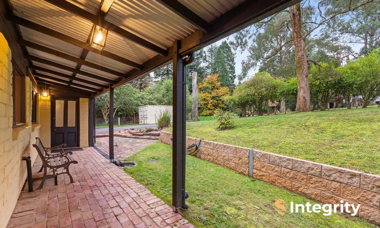 Quintessential Mudbrick Charm On Over Half Acre