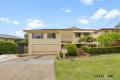 THE BEST PRICED FAMILY HOME IN WISHART - AN OUTSTANDING OPPORTUNITY!!