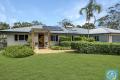LOW SET BRICK HOME, 5724M2 IN BROADACRES ESTATE
