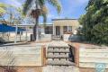 ELEVATED BLOCK, AIR CONDITIONED & RENOVATED LOW SET BRICK HOME