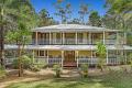 Beautiful Queenslander-style home with pool and tennis court