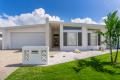 BRAND NEW! Luxury Living in Pelican Waters!