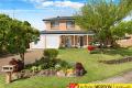 Picture Perfect !! On Large 710m2 Landscaped Block