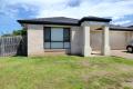 LARGE BLOCK- LOWSET 4 BED BRICK HOME