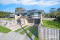 Elevated, Updated, Immaculate with Side Access