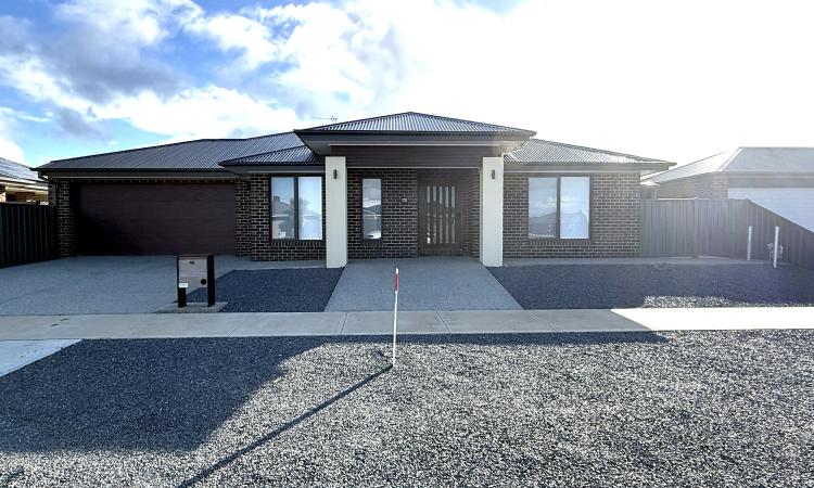 Neat as a Pin ~ Four-Bedroom Near-New Home with Zero Yard Maintenance