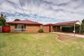 Exceptionally positioned, solid brick family home located in sought after Rangeville