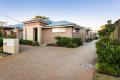 Modern, stylish unit - Low maintenance & conveniently located!