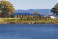 Stunning River Frontage Home