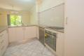 Three bedroom ground level unit with brand new kitchen.