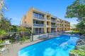 Modern beach unit common pool - fully furnished