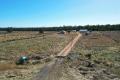 Generous Acreage with Three Homes and Massive Sheds