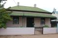 Neat Cottage with a Bullnose Verandah