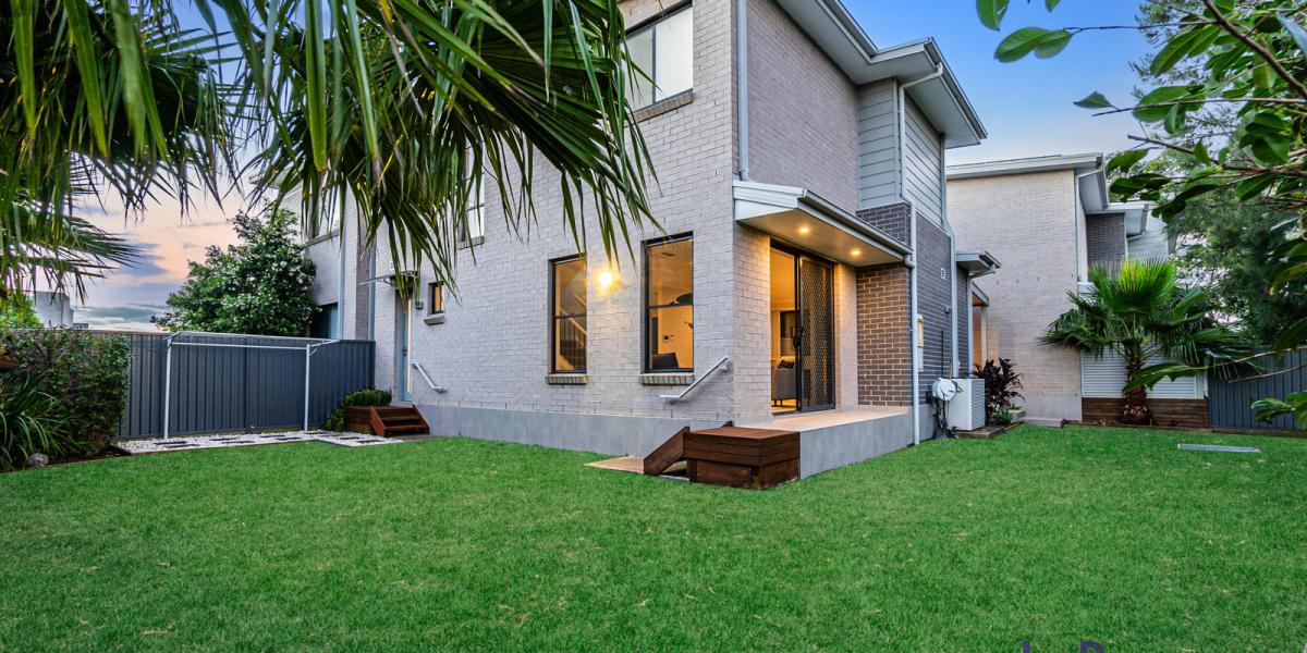 Contemporary Home with Oversized Garage & Generous Yard