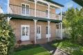 CHARMING AND IMMACULATE BRICK HOME, AIR-CONDITIONING, COVERED OUTDOOR ENTERTAINING, DOUBLE CARPORT, FULLY FENCED