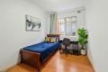 Two bedroom unit near shops and train station
