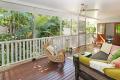 Immaculate Queenslander surrounded by tropical rainforest