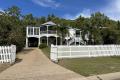 Modern Queenslander with water views adjoining National Park